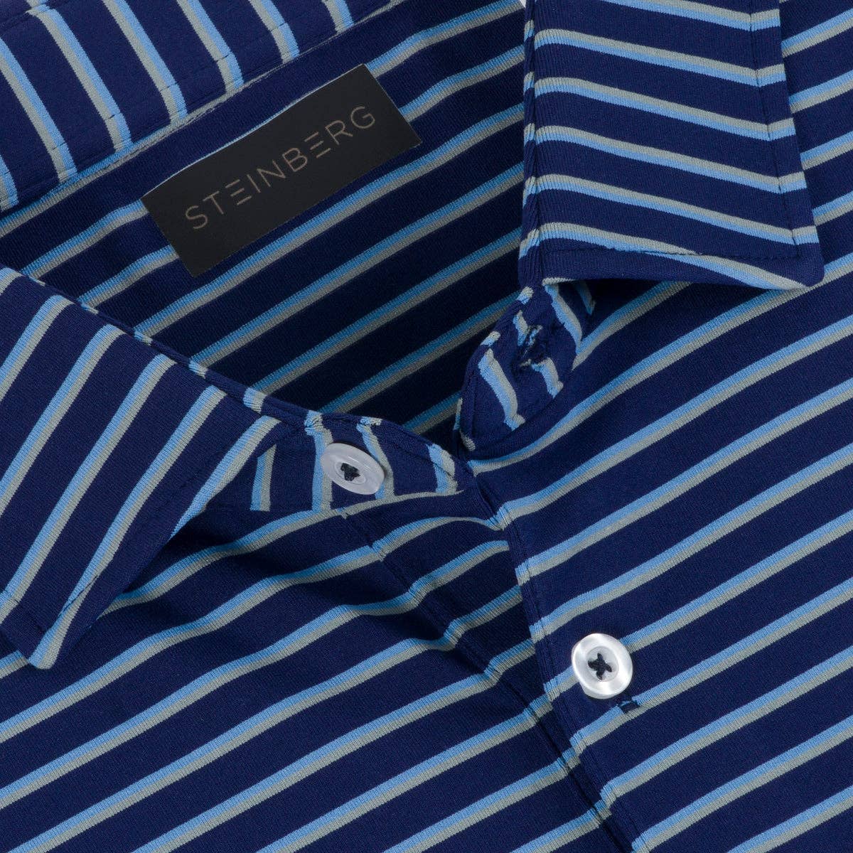 The Bluewater Links Flyway Polo: Navy/Sky/Silver